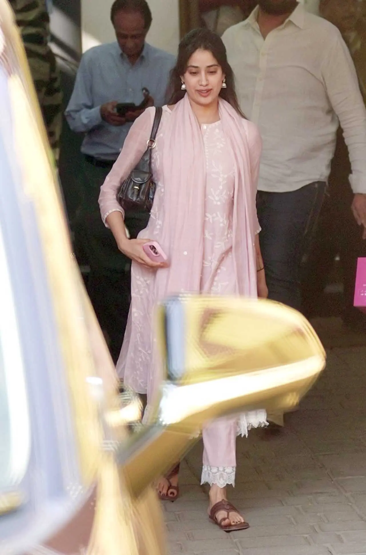 Janhvi Kapoor was spotted returning from Tirupati after celebrating her birthday with a spiritual visit. The actor looked graceful in a blush pink suit as she stepped out at the airport.